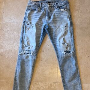 Men's Light Blue Distressed Jeans. American eagle
